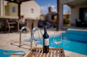 New villa with swimming pool, olive grove and sea view by Traveler tourist agency Krk ID 2201