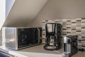 Appartements Le Duplex, proche centre-ville : photos des chambres