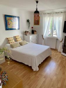 Villas Charmante villa avec une ame. : photos des chambres