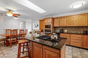 Captivating Continental Country Club Retreat with 4 BDR and Spacious deck!