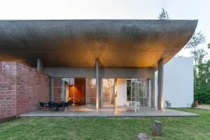 SaffronStays Cafella- A 3-BDR elliptical-roof villa in Chikmagalur - Mudigere