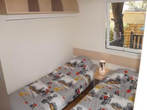 Campings Le TropeZen Confort Plus TV WIFI VOD Salle de Sport ! : photos des chambres