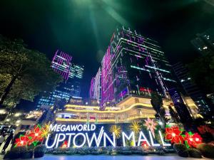 BGC Luxury Condo - Pool, Wi-Fi, City View - Suite 14