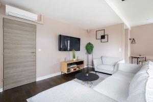 Appartement de 100m2 dans un parc à 20 mn du centre de Paris