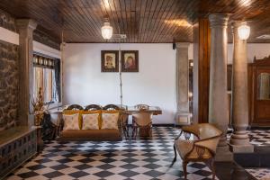 SaffronStays Peshwaai - 5BR Karjat villa with lawn pool & terrace plunge, mezzanine family rooms, near Songiri & Kondhana
