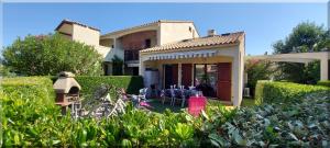 Hameau du Rivage 224 - Rez de jardin climatisé - 3 étoiles - 6 Pers - Jardin - Piscine - Vélos prêtés - Parking - 400m de la plage de La Lagune - WIFI
