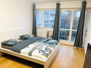 Sejours chez l'habitant 1-Chambre lumineuse (Paris-Orly) : photos des chambres