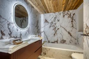 Appartements Les Chalets de La Clusaz - Appartement Le Faon : photos des chambres