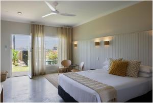 포스터 South Pacific Palms Motor Inn 3성급 호텔 스위트룸