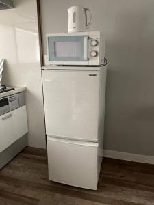 谷六駅徒歩1分 電車で心斎橋まで4分 梅田まで16分 USJまで30分 3寝室 MAx9人