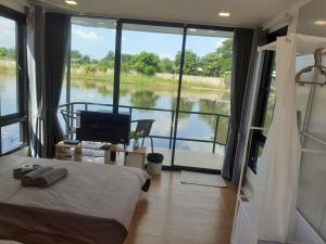 ริมกว๊านชาเลย์ รีสอร์ทแอนด์คาเฟ่ Rimkwan Chalay Resort and Cafe