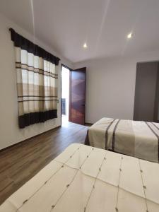 Casa Mictlan. Habitaciones en el Centro de Mitla.