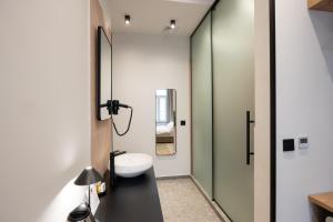 Hop Inn Rooms & Suites