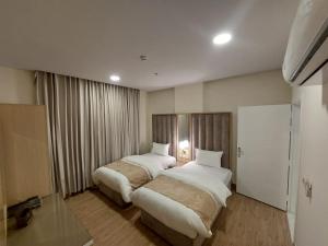 شقق كيان البستان للشقق المخدومة