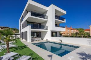 Deluxe villa with heated pool, whirpool, sea view near beautiful beach III - by Traveler tourist agency Krk ID 2402