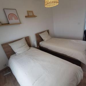 Maisons de vacances TYVAC - Maison centre Plougasnou 2 chambres- 4 voyageurs : photos des chambres