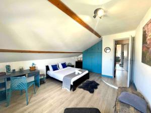 Maisons de vacances La Casa Del Papa - Maison spacieuse avec jardin : photos des chambres