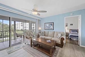 Coastal style condo with pool, spa and steps to beach