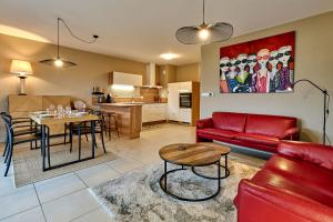 Le Manou, Appartement neuf avec terrasse, parking sous-terrain & ascenseur