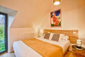 Appartements Nid douillet a 30 metres de la grande plage de Houlgate - RESIDENCE LA VAGUE - : photos des chambres