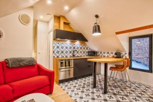 Appartements Nid douillet a 30 metres de la grande plage de Houlgate - RESIDENCE LA VAGUE - : photos des chambres