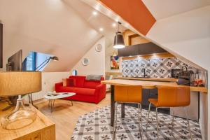 Appartements Nid douillet a 30 metres de la grande plage de Houlgate - RESIDENCE LA VAGUE - : photos des chambres