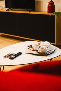 Appartements Nid douillet a 30 metres de la grande plage de Houlgate - RESIDENCE LA VAGUE - : photos des chambres