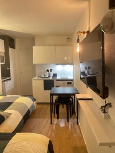 Appartements T2D Apartment - Suite UR proche Disneyland Paris : photos des chambres