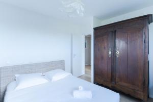 Maisons de vacances TY NEVEZ - Jolie maison neuve avec petite vue mer : photos des chambres