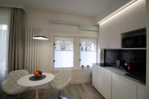 Modern stúdió a Belváros közepén parkolóval- Kata stúdióapartman