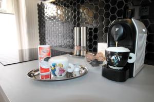 Modern stúdió a Belváros közepén parkolóval- Kata stúdióapartman