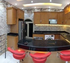 شاليه 4 غرف نوم مكيف بالكامل مارينا الساحل الشمالي العلمين تاني صف على البحيرة الرملية