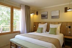 Appart'hotels Domaine du Ferret Restaurant & Spa : photos des chambres