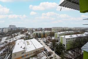 10th Floor Apartment with a Nice City View in Wrocław by Renters