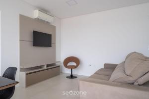 Belo apto com churrasqueira 100m da praia BLN0802