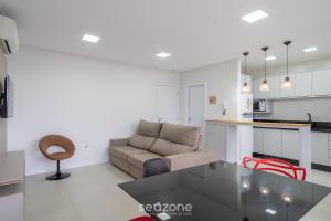 Belo apto com churrasqueira 100m da praia BLN0802