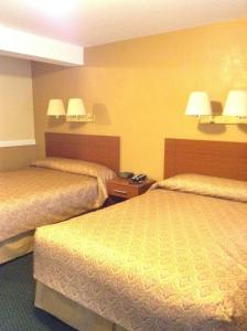 Queen Room with Two Queen Beds room in Briarcliff Motel