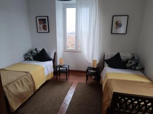 Chambre Quadruple avec Salle de Bains Privative