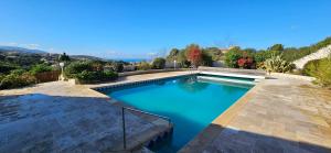 Villas Villa de standing Les Amandiers, vue mer & piscine : photos des chambres