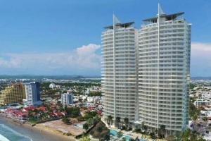 Hermoso Condo al Pie de la Playa Camino al Mar