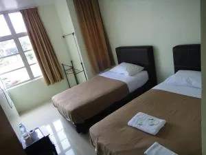 美茵旅馆酒店 - Kampong Batu Papan