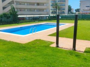 Planta Baja con Piscina y Parking en Miami Playa, Cerca del Mar - ES-9-155