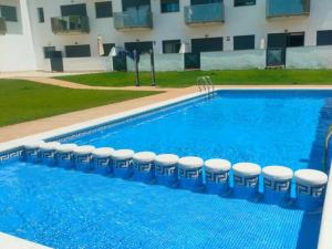 Planta Baja con Piscina y Parking en Miami Playa, Cerca del Mar - ES-9-155