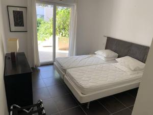 Grand T2 aux Issambres, jardin privatif, piscine, wifi, clim, parking - FR-1-768-57