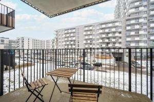 Black and White Apartment Close to the River in Wrocław by Renters