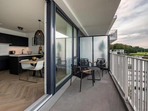 Apartment in Zeeland with Marina and Views
