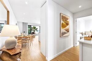 Stylish Modern Beachside Apartment with Pool & Seaview