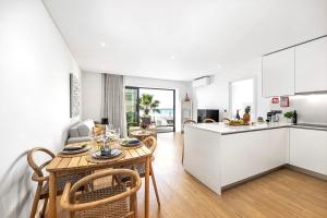 Stylish Modern Beachside Apartment with Pool & Seaview