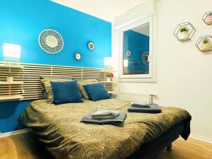 Appartements LOASIS - Appart T4 proche Gare et Centre Ville : photos des chambres