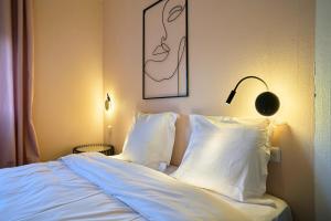 Appartements NG SuiteHome - Lille I Roubaix Barbieux I Montesquieu - Appartement 3 chambres - Netflix - Wifi - Kitchenette : photos des chambres